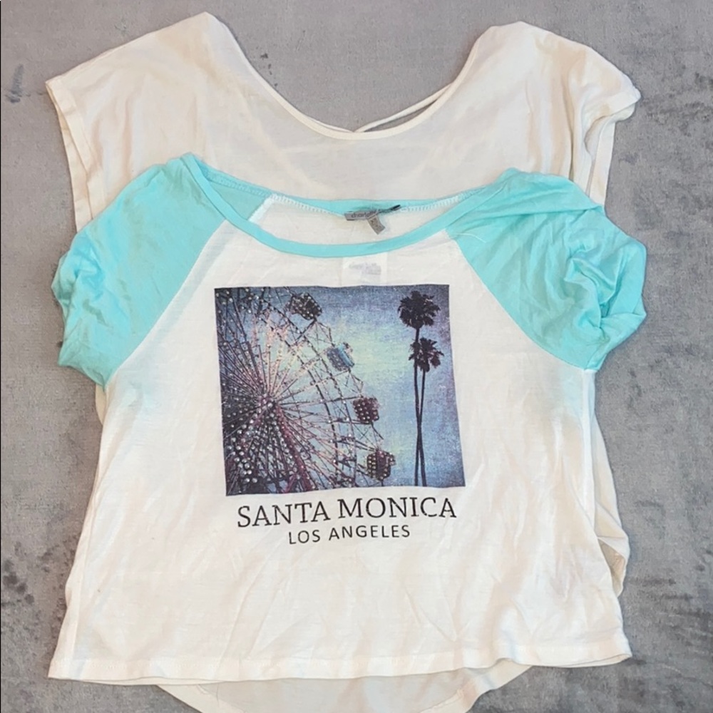$10 for blue shirt $5 for white shirt
